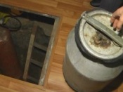 Участковый изъял у пенсионерки самогон в Назаровском районе